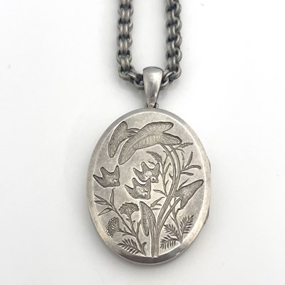 Lot 28 - A Victorian Aesthetic Movement white metal...