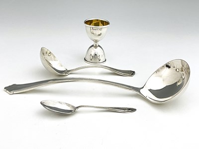 Lot 483 - An Elizabeth II silver soup ladle, Elkington &...