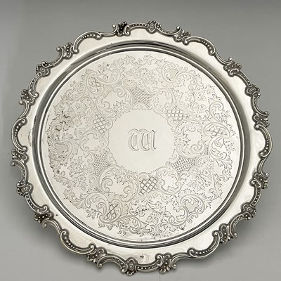 Lot 218 - A Victorian silver salver, decorated with...