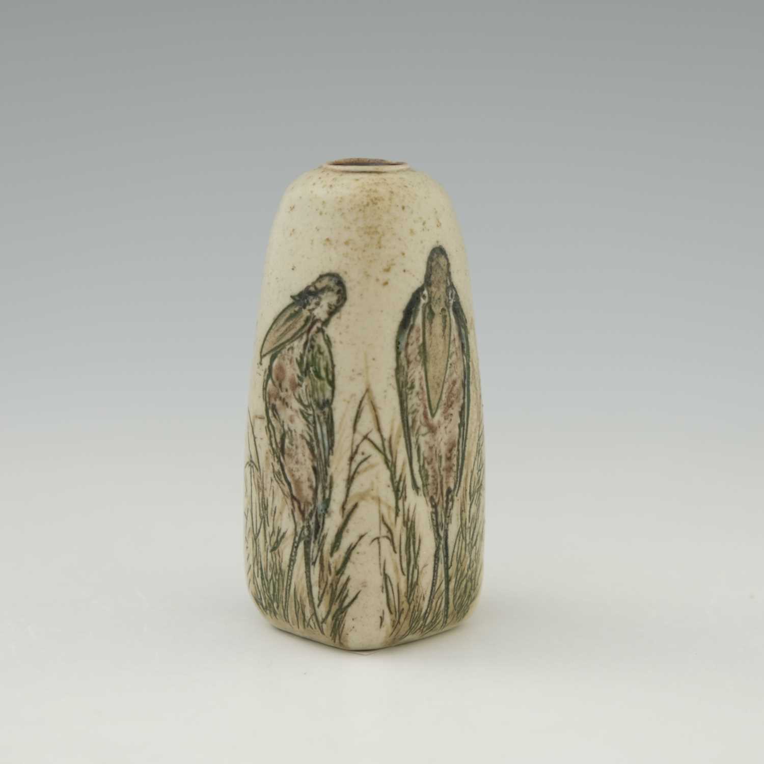 Lot 39 - The Martin Brothers, a small characterful bird...
