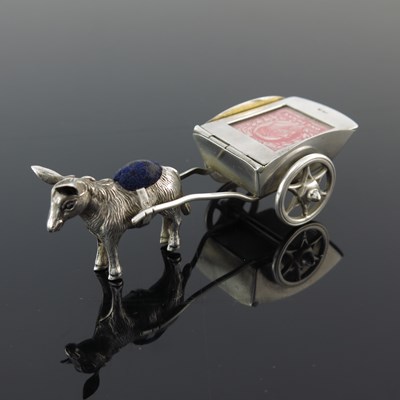 Lot 101 - An Edwardian silver novelty combination pin...