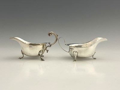 Lot 194 - Two similar twentieth-century silver sauce...