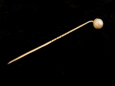 Lot 2 - A freshwater Scottish pearl stick pin, 9ct...