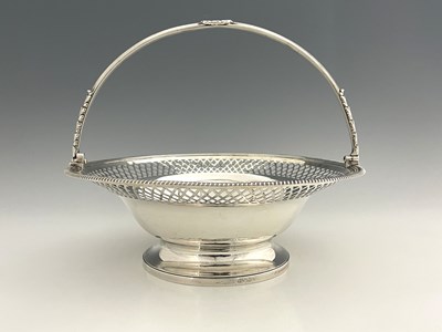 Lot 198 - Paul Storr. A George III silver swing handle...