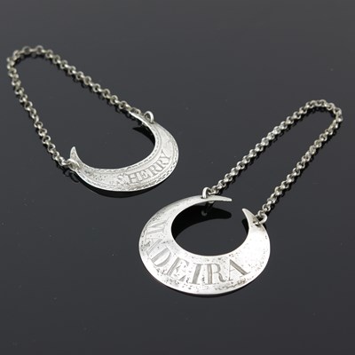 Lot 207 - Two eighteenth-century silver crescent-shaped...