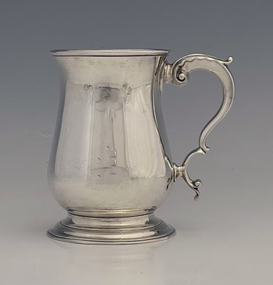 Lot 18 - A George III silver mug, of baluster form, the...