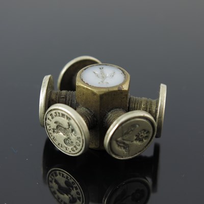 Lot 81 - A nineteenth-century rotating desk seal-wheel,...