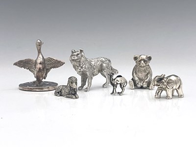 Lot 99 - Five twentieth-century silver-coloured metal...