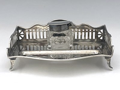 Lot 121 - An Edwardian silver inkstand, of shaped...