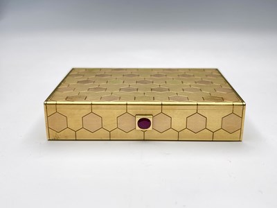 Lot 87 - Cartier. An 18ct gold box, of rectangular form,...