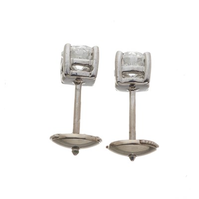 Lot 36 - A pair of 18ct gold diamond single-stone stud earrings