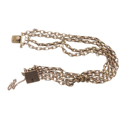 Lot 65 - An early 20th century 9ct gold four-row bracelet