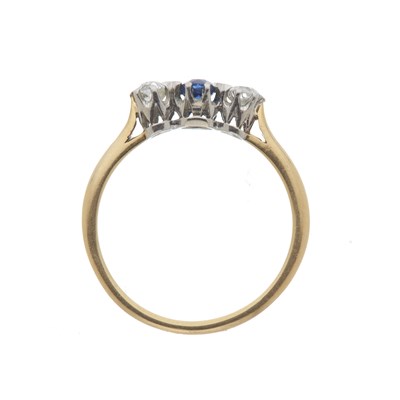 Lot 59 - An early 20th century 18ct gold sapphire and diamond three-stone ring