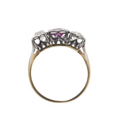 Lot 118 - A mid 20th century gold pink sapphire and diamond three-stone ring