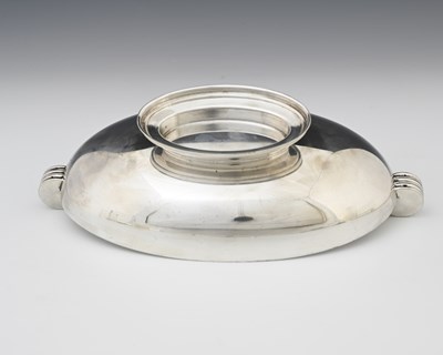Lot 80 - An Art Deco silver plated twin handled...