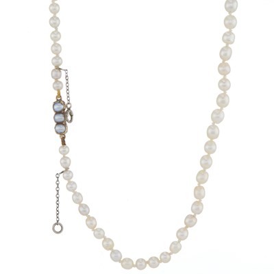 Lot 23 - An early 20th century natural pearl necklace, with gold clasp