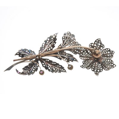 Lot 24 - A mid to late 19th century diamond and ruby floral spray brooch