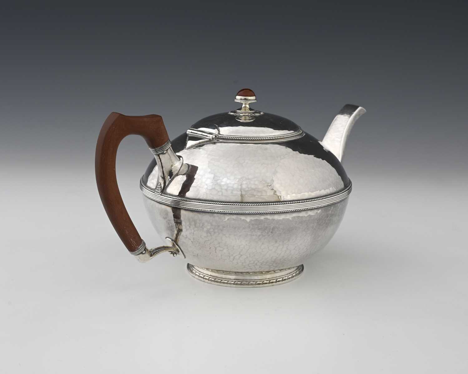 Lot 75 - John Sidney Reeve, an Arts and Crafts silver...