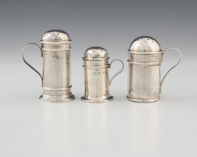 Lot 279 - A group of three silver kitchen peppers, to...