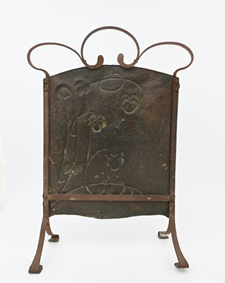 Lot 103 - An Art Nouveau wrought iron and copper fire...