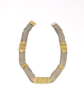 Lot 24 - A Middle Eastern silver and parcel gilt choker...