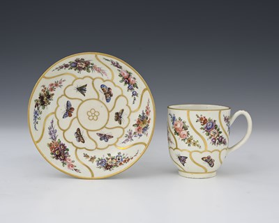 Lot 584 - A Worcester polychrome tea cup and saucer,...