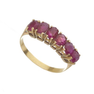 Lot 65 - An 18ct gold ruby six-stone ring