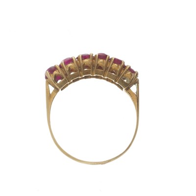 Lot 65 - An 18ct gold ruby six-stone ring