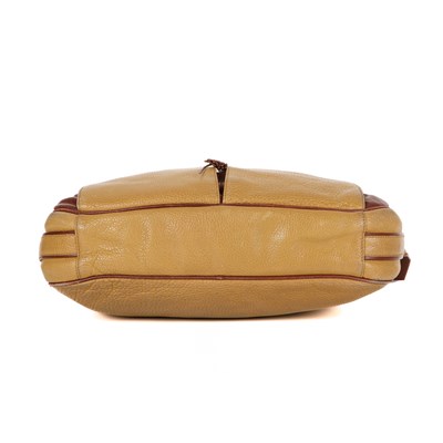 Lot 209 - Cartier, a leather Must de Cartier crossbody bag.