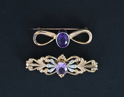 Lot 6 - Two gold amethyst brooches