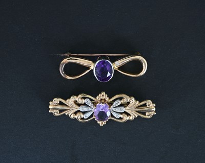 Lot 6 - Two gold amethyst brooches
