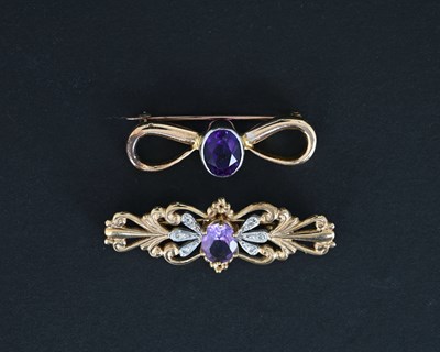 Lot 6 - Two gold amethyst brooches