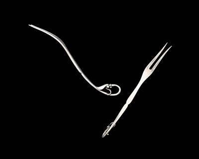 Lot 65 - Georg Jensen. A matched pair of silver Georg...