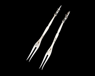 Lot 65 - Georg Jensen. A matched pair of silver Georg...