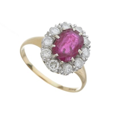 Lot 43 - An 18ct gold ruby and diamond cluster ring