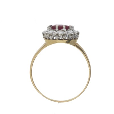 Lot 43 - An 18ct gold ruby and diamond cluster ring