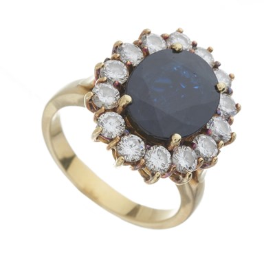 Lot 57 - An 18ct gold sapphire and diamond cluster ring