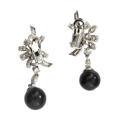 Lot 104 - A pair of grey cultured pearl and diamond drop earrings
