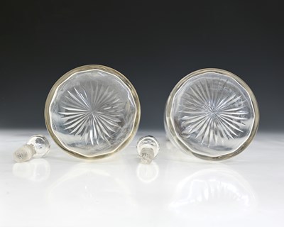 Lot 109 - A pair of George V silver-mounted glass...