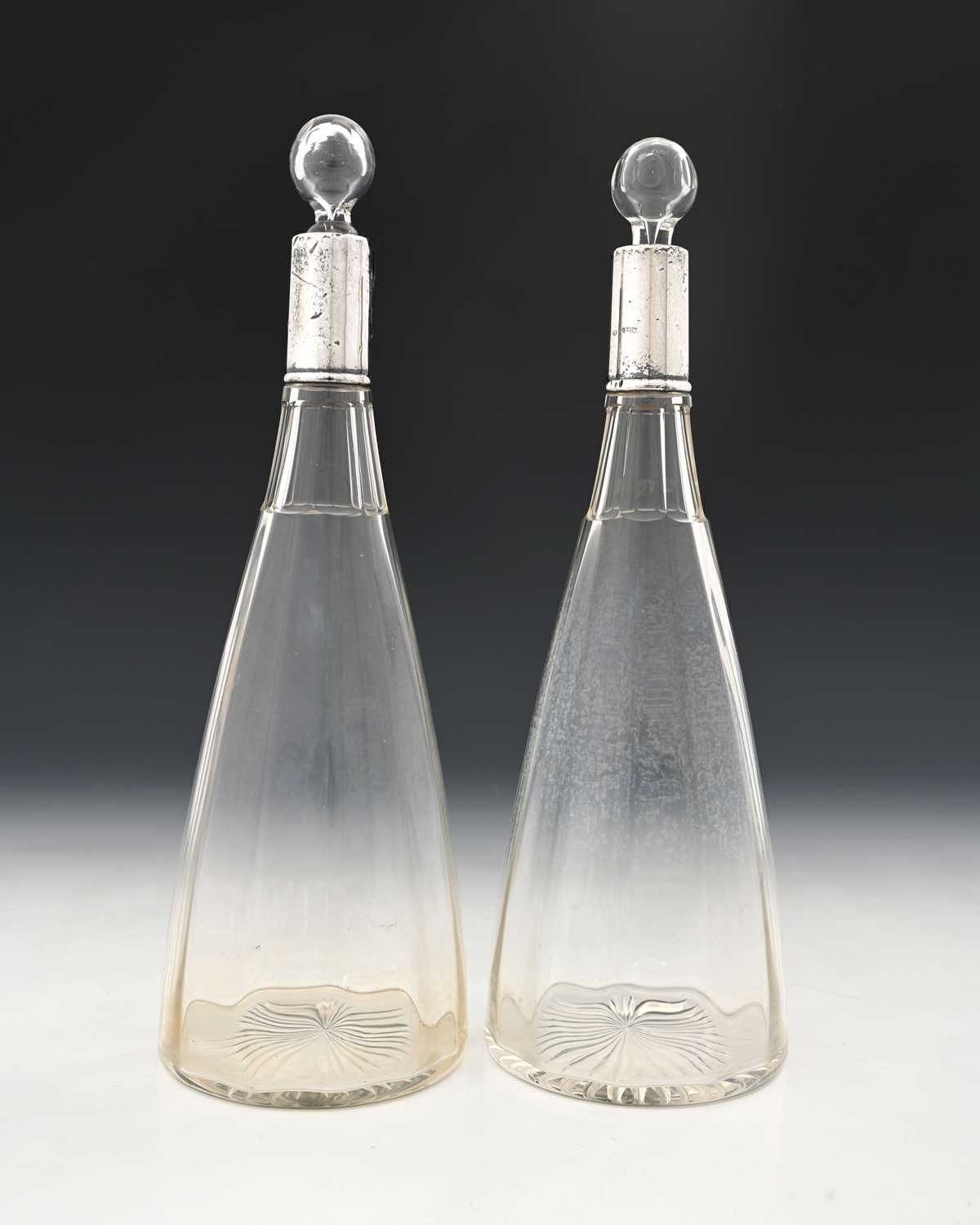 Lot 109 - A pair of George V silver-mounted glass...