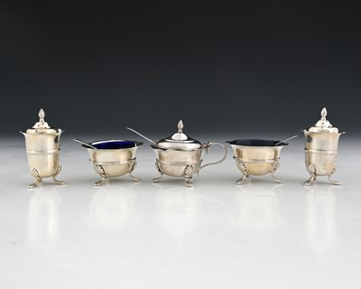 Lot 152 - An Edwardian silver condiment set, comprising...