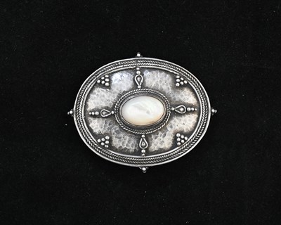 Lot 16 - An Arts and Crafts silver and mother of pearl...