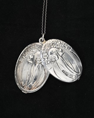 Lot 34 - An Art Nouveau silver locket pendant, import...