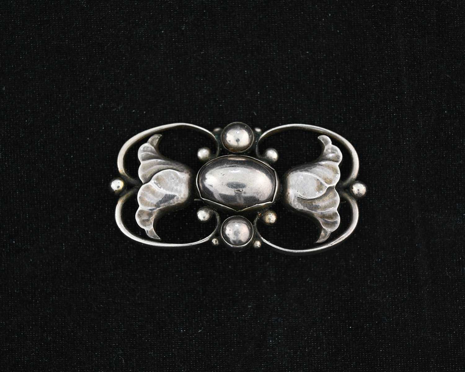 Lot 41 - Georg Jensen, a Sknovirke silver brooch, model...