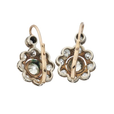 Lot 26 - A pair of late 19th century diamond cluster earrings