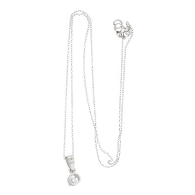 Lot 31 - An 18ct gold diamond single-stone pendant, with chain