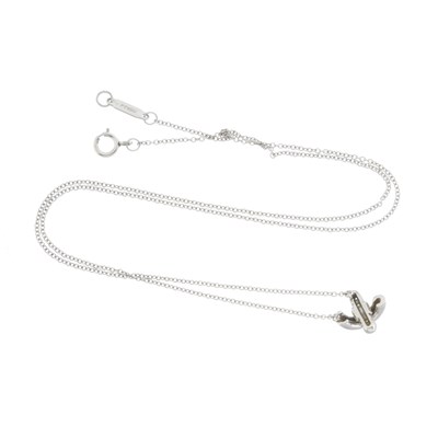 Lot 94 - Tiffany & Co., a platinum diamond Cross Stitch necklace