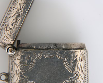 Lot 112 - A silver combination vesta snuff box, chased...