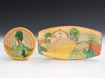 Lot 565a - Clarice Cliff, two dishes, including Farmhouse...