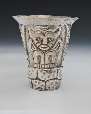 Lot 19 - A South American silver-coloured metal vase,...